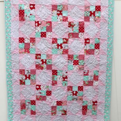Scrappy Nines Baby Quilt in Vintage Adventure