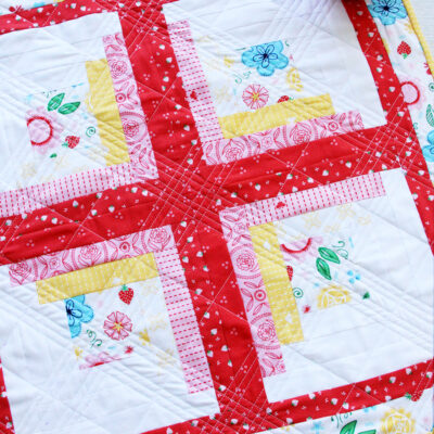 Colorful Log Cabin Mini Quilt in Flutter and Shine Fabric