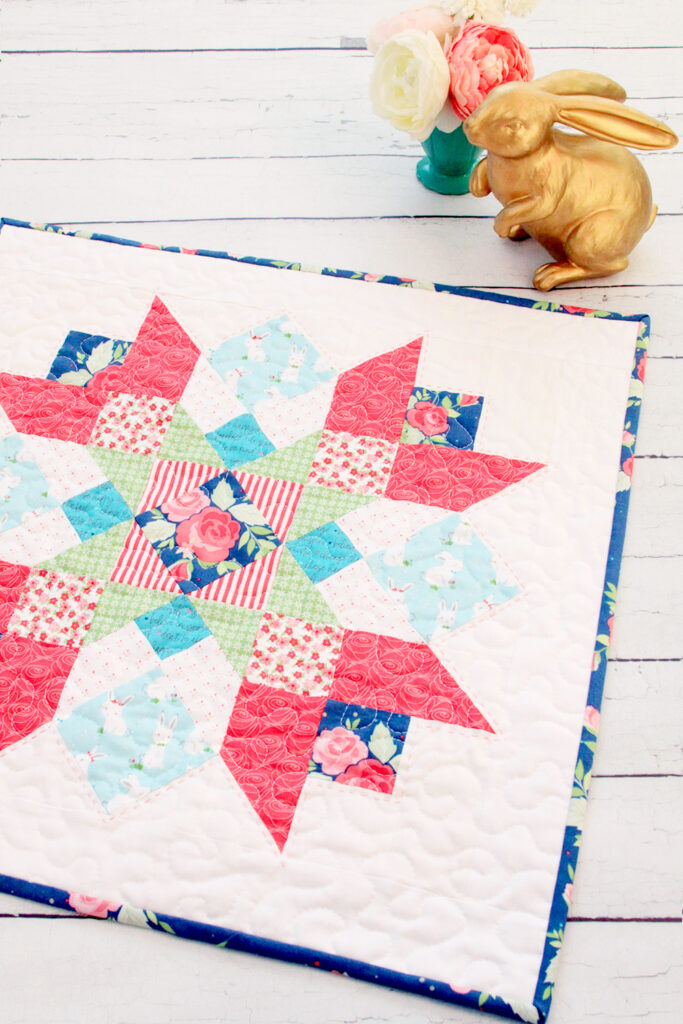 Winifred Rose Mini Quilt by popular US quilting blog, Flamingo Toes: image of a Winifred Rose Mini Quilt.