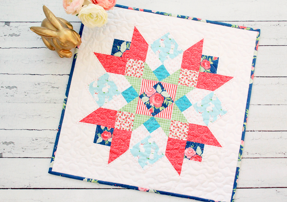 Winifred Rose Mini Quilt by popular US quilting blog, Flamingo Toes: image of a Winifred Rose Mini Quilt.