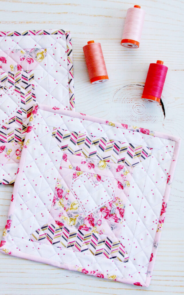 Love to Stitch Quilt Block pattern made of a sweet thread spool and heart